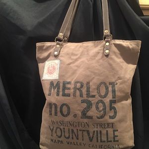 Vintage tote bag 17 x 14 x 5. Leather handles